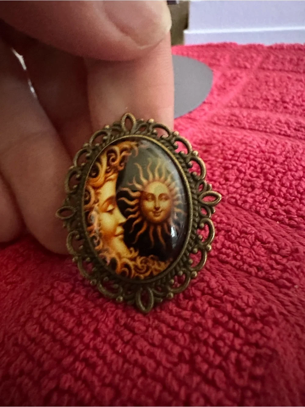 Celestial Sun & Moon Oval Brooch in Gold and Black